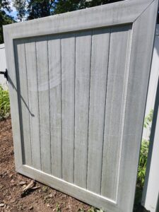 A Residential Fence Covered in Grime