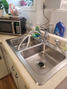 A Cleaned Kitchen with a Cleaned Sink
